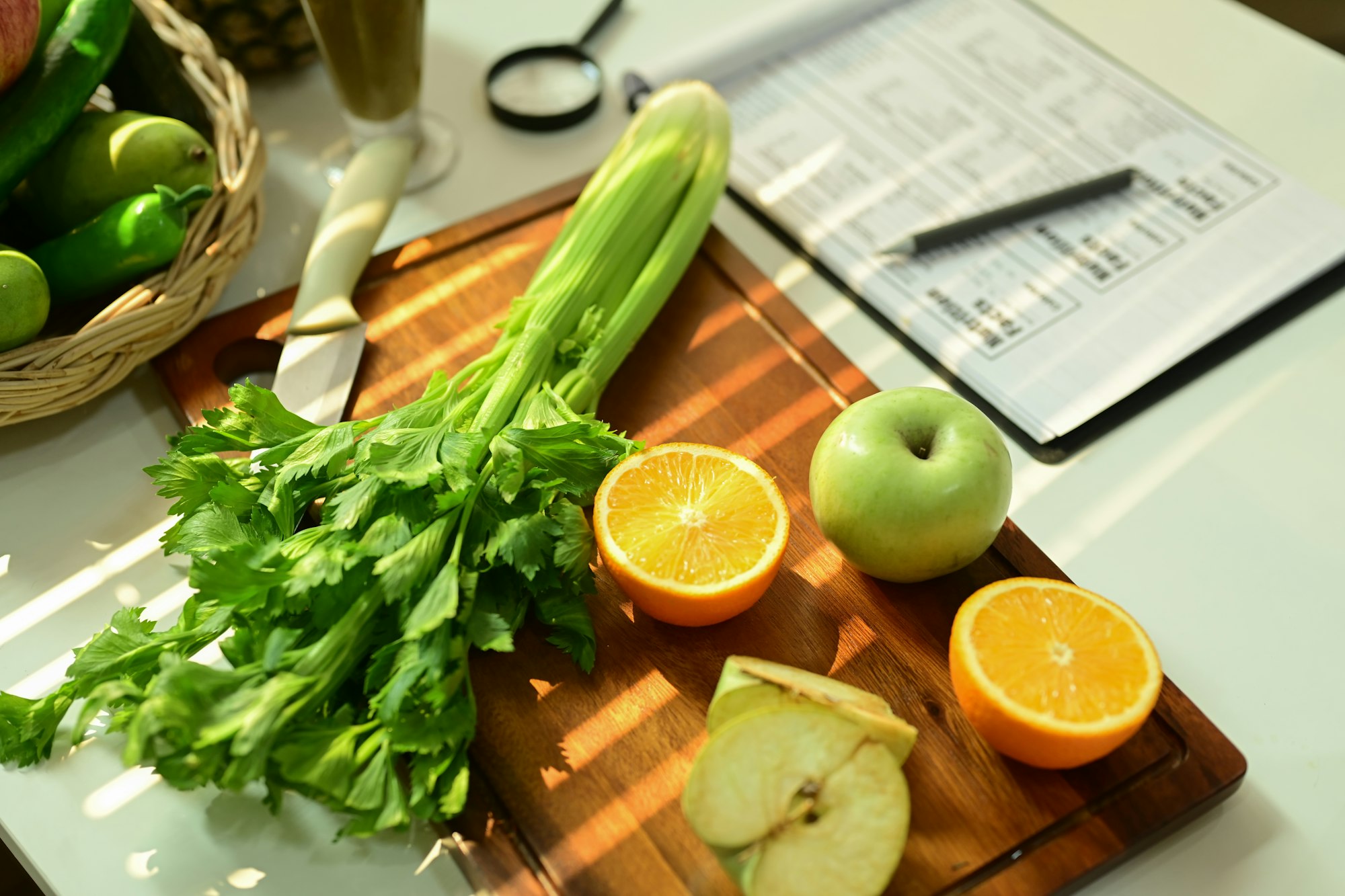 Fruit and vegetable on chopping board with Nutrition Facts on table.